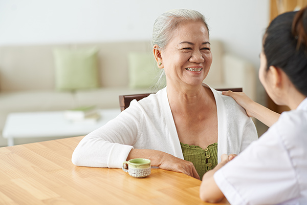 Talking to nurse Asian woman small2