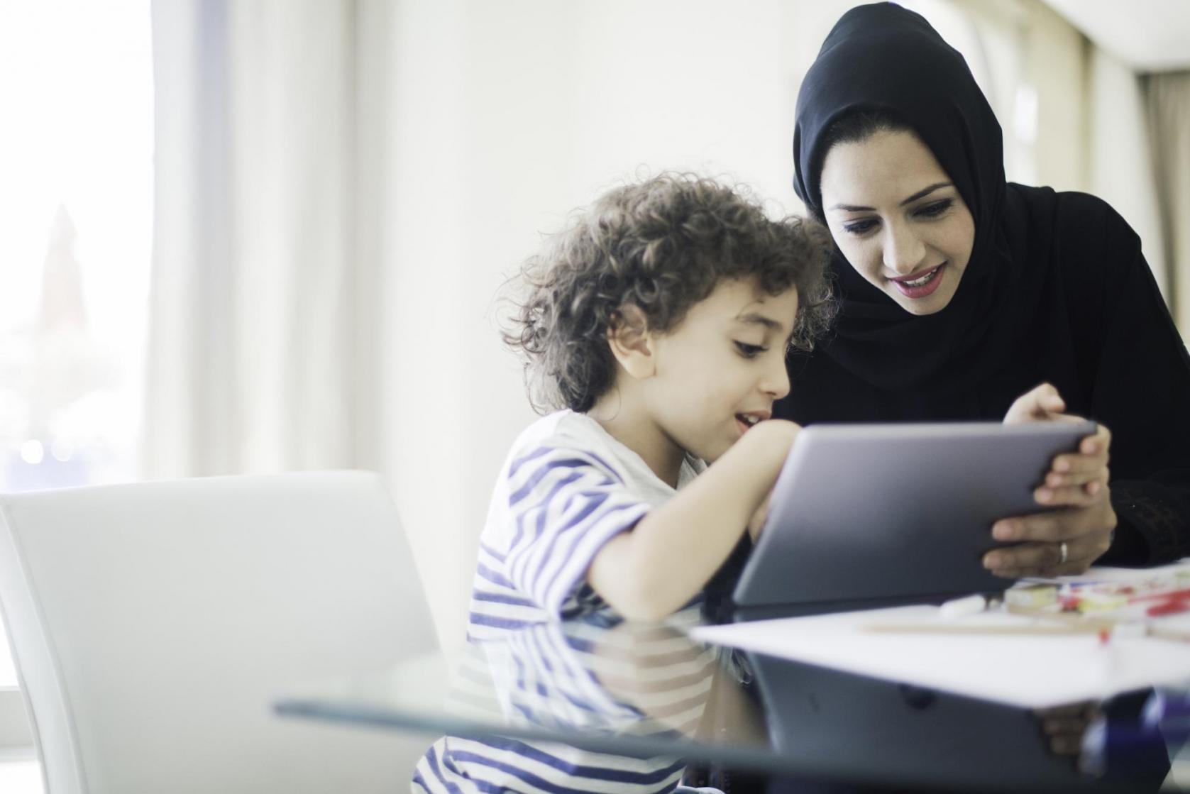 child and mother homework web